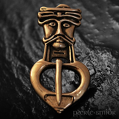 Gürtelschnalle mit Gesicht aus Gotland